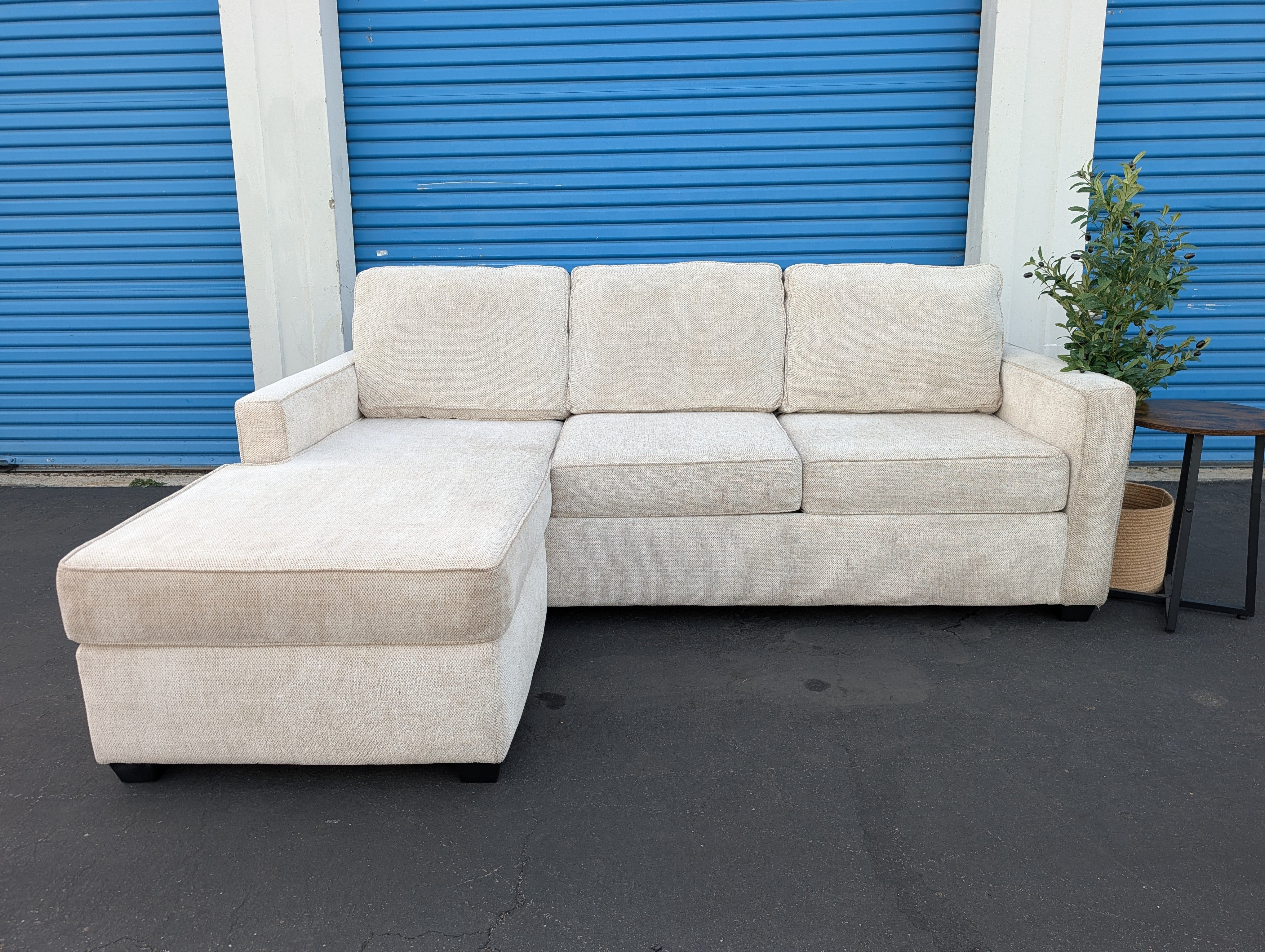 Living Spaces Reversible Beige Couch