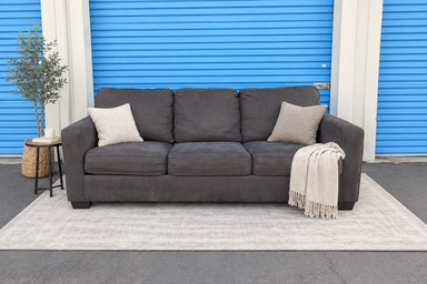 Black Sleeper Sofa — front ai