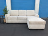 DRAFT — 09.21.26 Light beige Living Spaces L shape reversible chaise — front raw