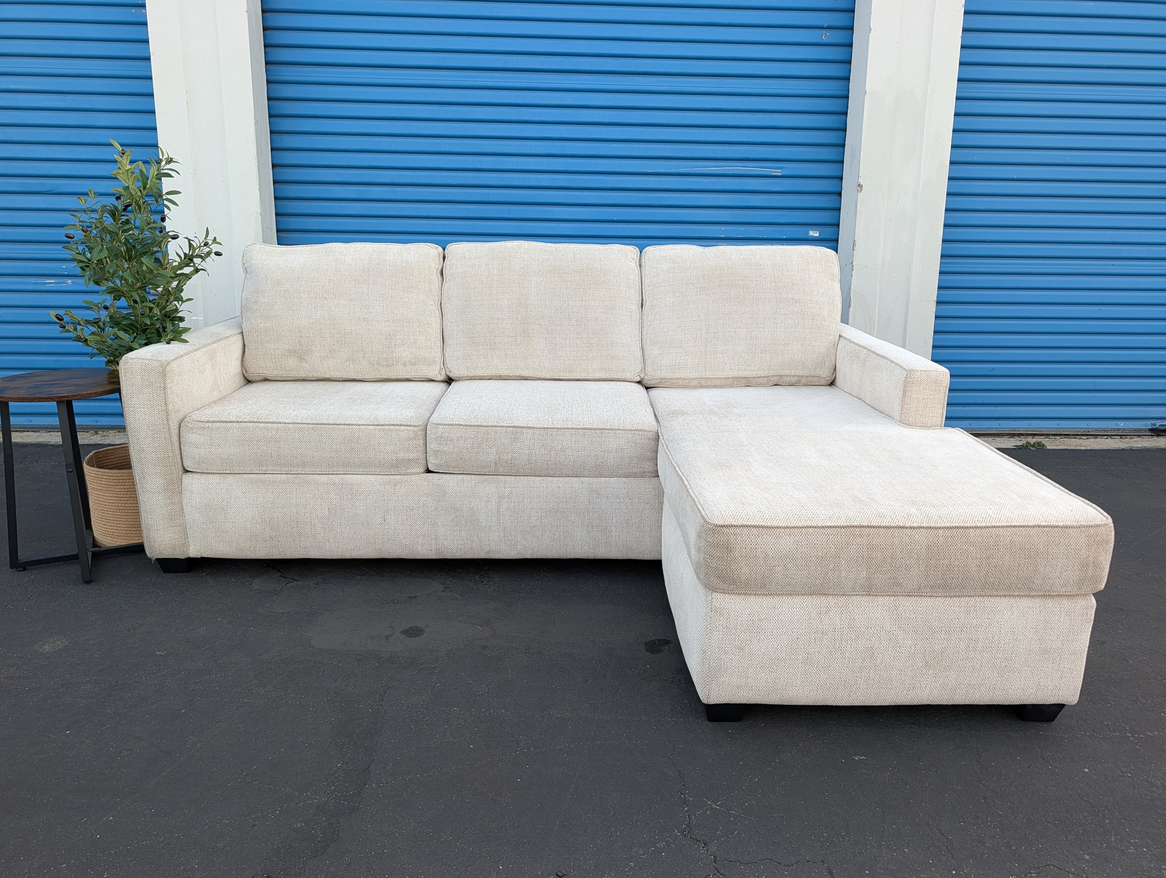 DRAFT — 09.21.26 Light beige Living Spaces L shape reversible chaise — front raw