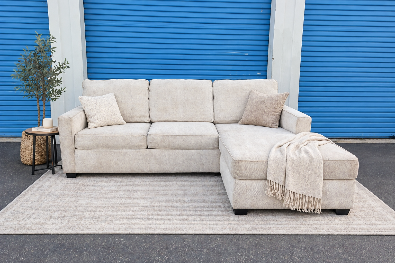 DRAFT — 09.21.26 Light beige Living Spaces L shape reversible chaise — front ai